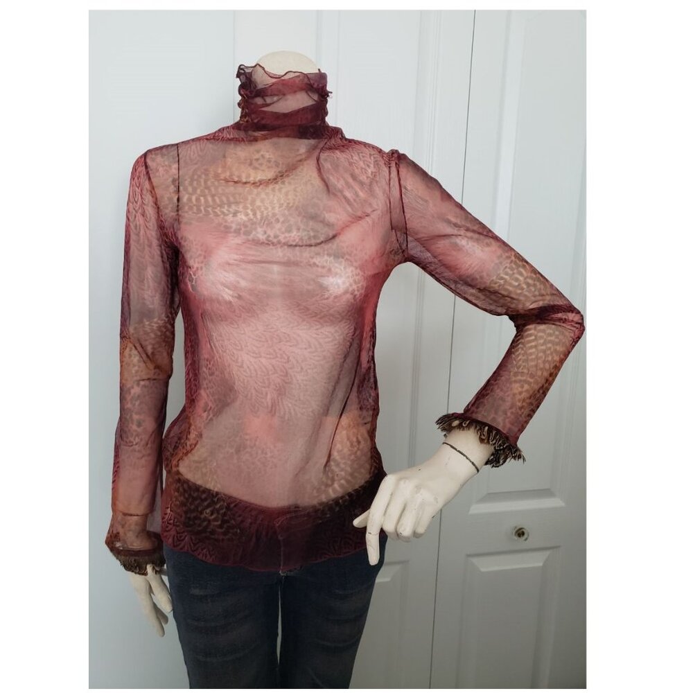 Burgundy sheer animal print long sleeve turtle neck with feathers on the sleeve